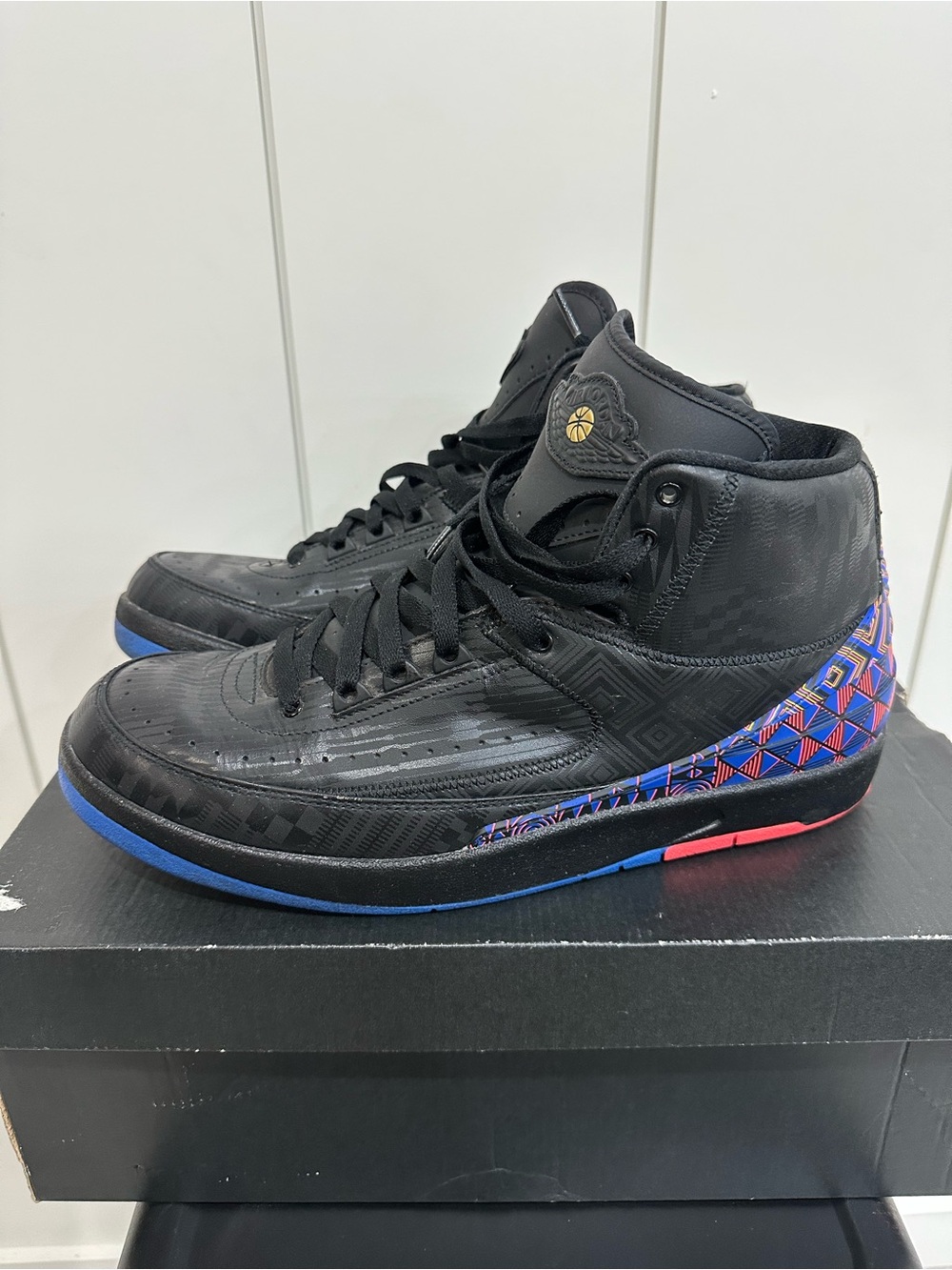 Jordan Men's Black High-Top Sneakers with Blue & Red Geometric Accents